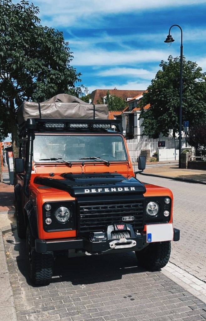 Red Land Rover Defender 90 spotted in the city