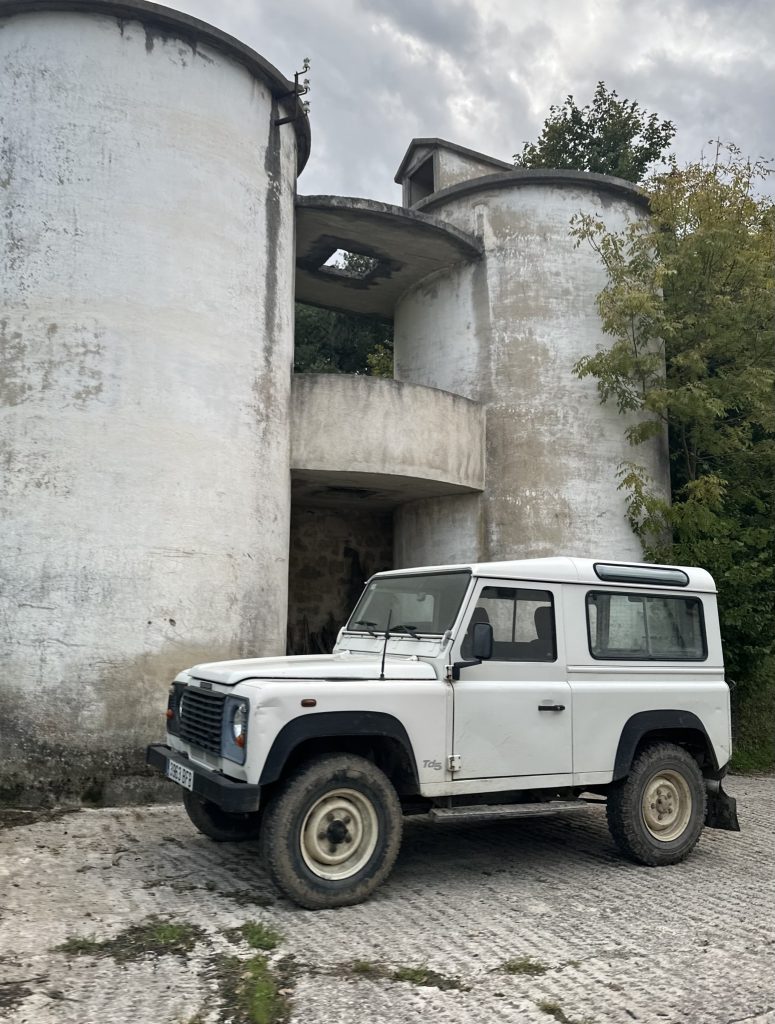 Land Rover Defender on a muddy trail in Ultzama Spain